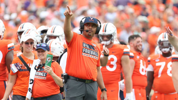 UVA head football coach Tony Elliott reacts during the Virginia football game against James Madison at Scott Stadium.